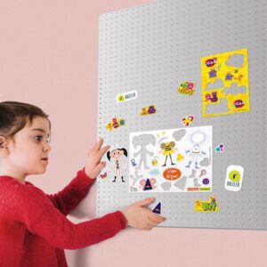 Girl playing on a metallic mural with Jumbo Custom Magnets