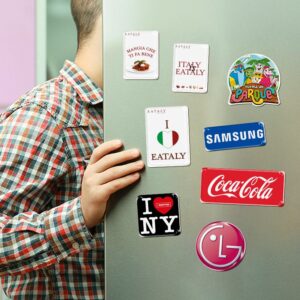 Man opening a refrigerator that has resin magnets Man opening a refrigerator that has Domed magnets